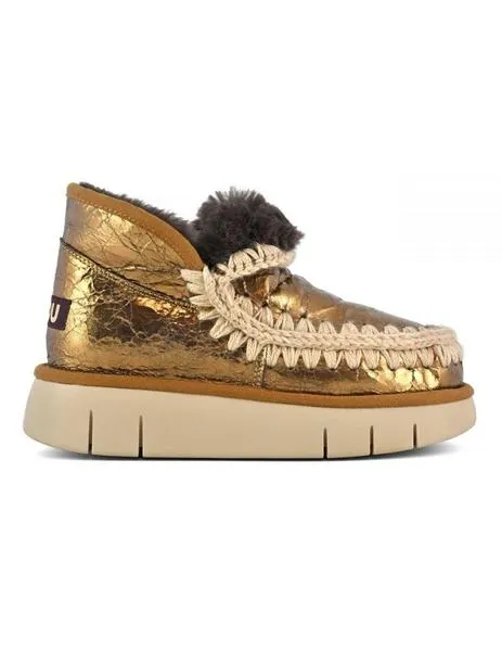 Sneaker dorada  Eskimal con plataforma de MOU